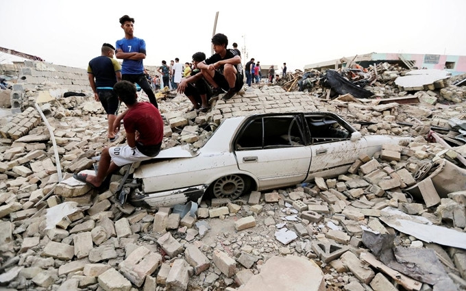 Hiện trường vụ nổ xảy ra tại Baghdad, tháng 6-2018. (Ảnh: Reuters)