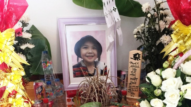 Di ảnh bé Lê Thị Nhật Linh. (Ảnh: Kyodo)