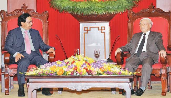 Tổng Bí thư Nguyễn Phú Trọng tiếp Thủ tướng Nhà nước Cô-oét S.Xa-ba.	Ảnh: TRẦN HẢI