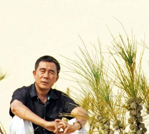 Chân dung nhà văn Nguyễn Quang Vinh. Ảnh: KHÁNH HIỂN