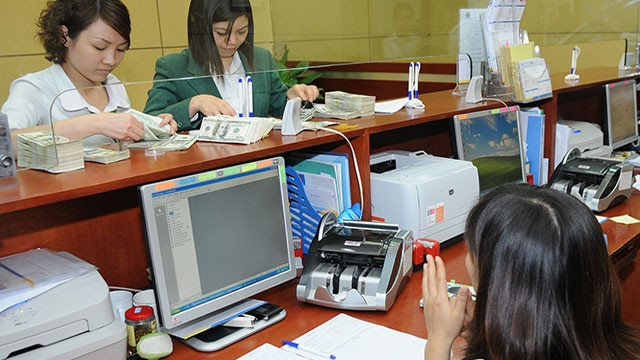 Doanh nghiệp nên chủ động có các biện pháp quản trị rủi ro tỷ giá để tránh những biến động khó lường của thị trường trong tương lai. Ảnh: HẢI ANH