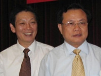 Quyền Chủ tịch UBND TP Hà Nội Nguyễn Thế Thảo (trái) và Bí thư Thành uỷ Phạm Quang Nghị.