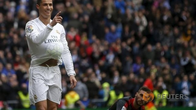 Ronaldo ăn mừng bàn thắng thứ ba vào lưới Celta Vigo. (Ảnh: Reuters)