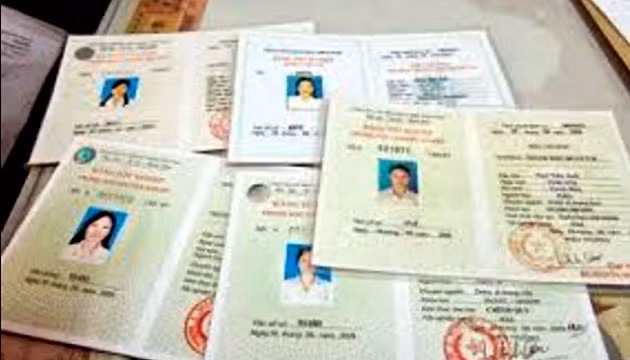 Mọi người nên cảnh giác và tố giác những hành vi của các đối tượng làm bằng giả. (Ảnh minh họa)