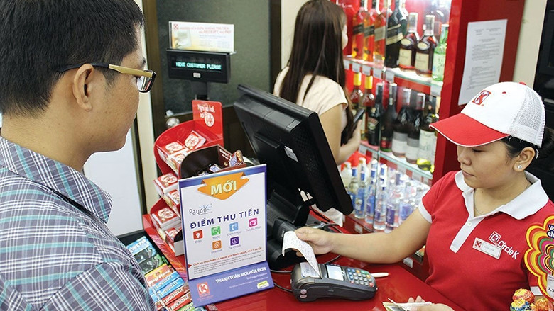 Với lượng người dùng lớn, thường xuyên, tổng giá trị giao dịch qua Payoo đạt 2 tỷ USD/năm. Ảnh: Trung Lĩnh