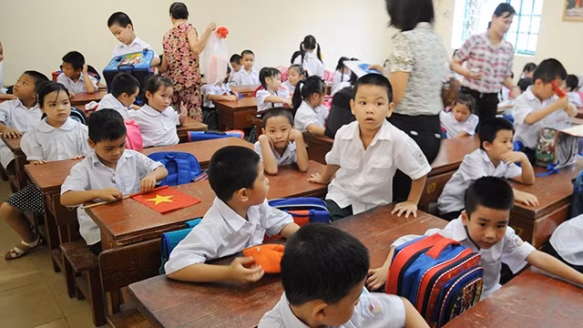 Sẽ có thay đổi nhằm giảm tải cho học sinh tiểu học. Ảnh: SONG ANH