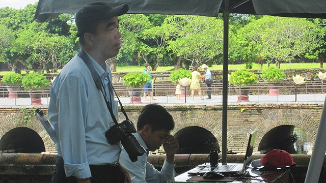 Đìu hiu cảnh đợi sang ảnh của bộ phận in ảnh trong nội thành xứ Huế (tỉnh Thừa Thiên - Huế).