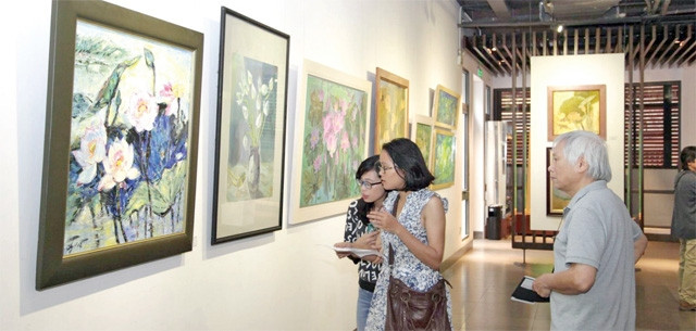Triển lãm mỹ thuật với chủ đề Sen tại Trung tâm giao lưu văn hóa phố cổ Hà Nội, tháng 5-2016. Ảnh | Báo du lịch