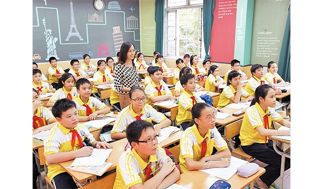 Giờ học tại Trường THCS Thái Thịnh, quận Ðống Ða (Hà Nội). Ảnh: ÐĂNG ANH