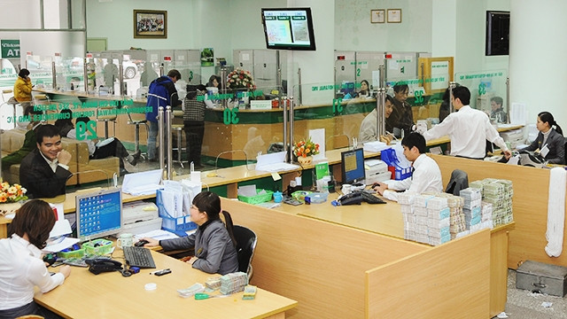 Nghị quyết 42 đã tạo hiệu ứng tích cực về xử lý nợ xấu cho các ngân hàng. Ảnh: HẢI NAM