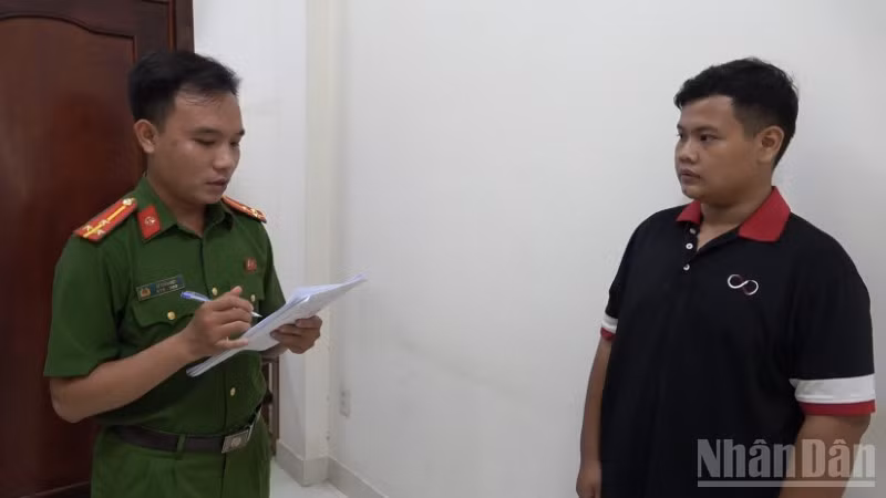 Đối tượng Huỳnh Quốc Lợi làm việc với cơ quan Công an.
