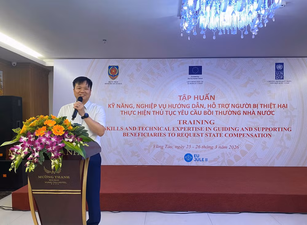 Ông Nguyễn Ngọc Vũ, Phó Cục trưởng Đăng ký giao dịch bảo đảm và Bồi thường nhà nước phát biểu tại hội nghị.