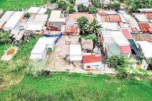 Nguồn lực đất đai bị lãng phí bởi quy hoạch treo, những quy định chưa bám sát thực tiễn. Trong ảnh: Khu đô thị Bình Quới-Thanh Đa quy hoạch gần 30 năm chưa triển khai.