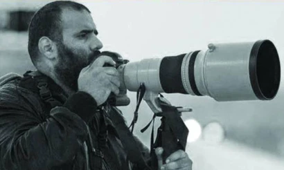 Phóng viên ảnh Khalid Al-Misslam. (Ảnh: Gulf Times)