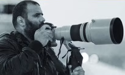 Phóng viên ảnh Khalid Al-Misslam. (Ảnh: Gulf Times)