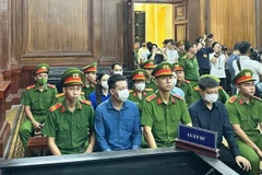 Các bị cáo tại phiên tòa. 