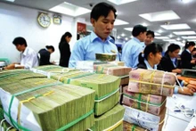 Giải thể Ủy ban Giám sát tài chính Quốc gia. (Ảnh: VGP)