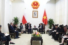 Phó Thủ tướng Bùi Thanh Sơn đã tiếp Phó Thủ tướng, Bộ trưởng Kỹ thuật số Cộng hòa Ba Lan. (Ảnh: VGP/Hải Minh)