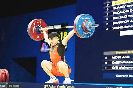 Vận động viên Nguyễn Thành Duy giành Huy chương vàng cử tạ hạng 65 kg nam.