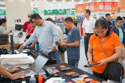 Nhiều chương trình xúc tiến thương mại được tổ chức để đẩy mạnh tiêu dùng nội địa. Ảnh: NAM NGUYỄN