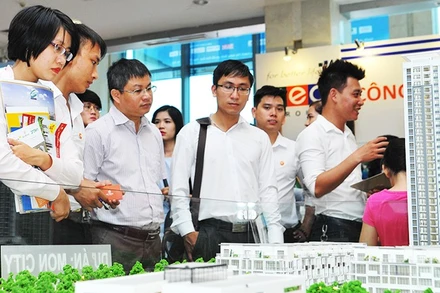 Lãi suất cho vay đầu tư kinh doanh bất động sản sẽ tiếp tục duy trì ở mức cao hơn mặt bằng chung. Ảnh: NGUYỆT ANH