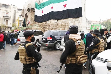 Lực lượng an ninh Syria bảo vệ một sự kiện tại Thủ đô Damas. Ảnh: CNN