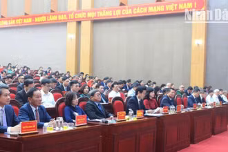 Các đại biểu dự Lễ công bố Nghị quyết của Quốc hội, Ủy ban Thường vụ Quốc hội về việc kết thúc hoạt động đơn vị hành chính cấp huyện, sắp xếp các đơn vị hành chính cấp xã tại Sơn La.