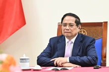 Thủ tướng Chính phủ Phạm Minh Chính điện đàm với Thủ tướng Malaysia Anwar Ibrahim. (Ảnh: Trần Hải)