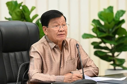 Tổng Bí thư Thongloun Sisoulith phát biểu tại Hội nghị. (Ảnh: Báo Pasaxon)