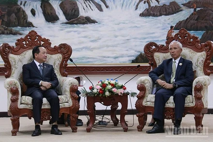 Trưởng Ban Tuyên giáo và Dân vận Trung ương Trịnh Văn Quyết làm việc với Trưởng Ban Tuyên huấn Trung ương Lào Khamphanh Pheuyavong. (Ảnh: DUY TOÀN)