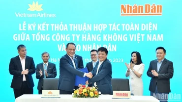 Ký kết hợp tác toàn diện giữa báo Nhân Dân và Vietnam Airlines