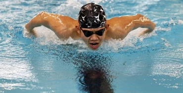 Quang Thuấn về đích ở nội dung 400m hỗn hợp nam, hơn đàn anh Hưng Nguyên tới gần chín giây. Ảnh: VASA