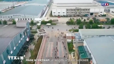 Hình ảnh trong phóng sự của TF1 mô tả vùng ven Hà Nội được ví như "đại lộ Champs-Élysées công nghiệp của miền bắc Việt Nam". (Ảnh: TTXVN phát)