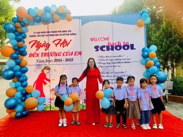 Chính sách miễn học phí sẽ góp phần thúc đẩy xây dựng trường học hạnh phúc.