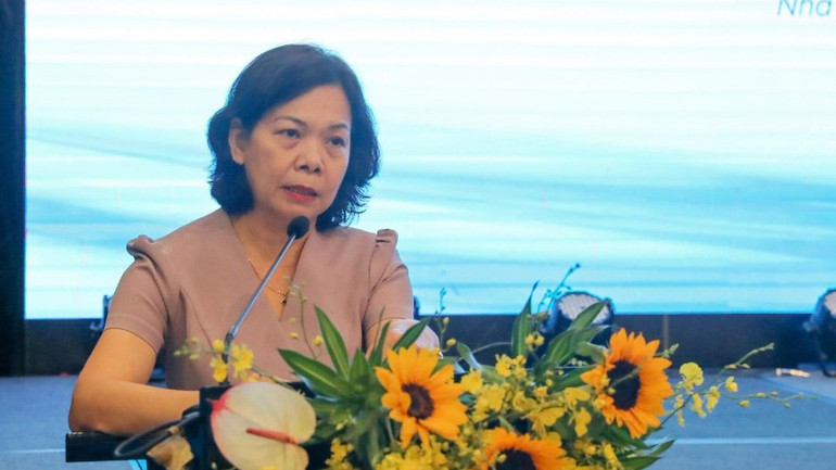 Phó Vụ trưởng Vụ Pháp chế Ngân hàng Nhà nước Vũ Ngọc Lan. ms-lan-ngan-hang-nha-nuoc-7988.jpg