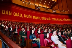 Các đại biểu tham dự phiên thảo luận các văn kiện Đại hội sáng 28-1. Ảnh: VŨ ANH TUẤN - DUY LINH.