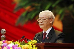 Đồng chí Nguyễn Phú Trọng, Tổng Bí thư Ban Chấp hành T.Ư Đảng, Chủ tịch nước CHXHCN Việt Nam đọc Báo cáo của Ban Chấp hành T.Ư Đảng khóa XII về các văn kiện trình Đại hội.