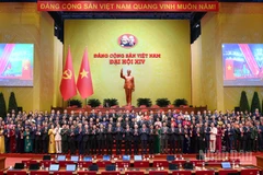 Các đồng chí lãnh đạo Đảng, Nhà nước với các đại biểu tại phiên thảo luận tại hội trường về các Văn kiện Đại hội. (Ảnh: ĐĂNG KHOA)