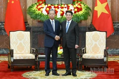 Chủ tịch nước Lương Cường và Ủy viên trưởng Nhân đại toàn quốc Trung Quốc Triệu Lạc Tế.