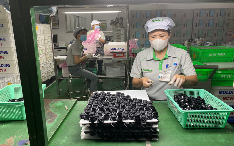 Ảnh minh họa: Dây chuyền sản xuất linh kiện điện tử tại Công ty TNHH Nidec Việt Nam, Khu công nghệ cao Thành phố Hồ Chí Minh.