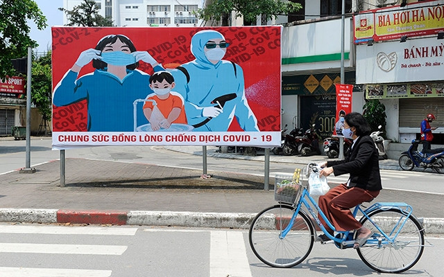 Tinh thần cộng đồng của người Việt đã được khơi dậy và ngời sáng trong khó khăn. Ảnh: Đăng Khoa 