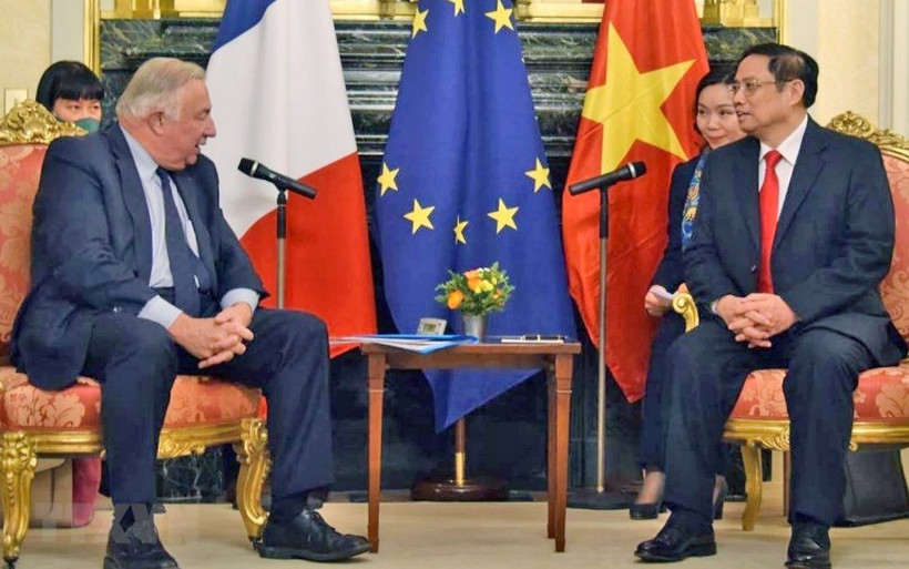 Thủ tướng Chính phủ Phạm Minh Chính và Chủ tịch Thượng viện Pháp Gerard Larcher tại buổi hội kiến. (Ảnh: TTXVN)