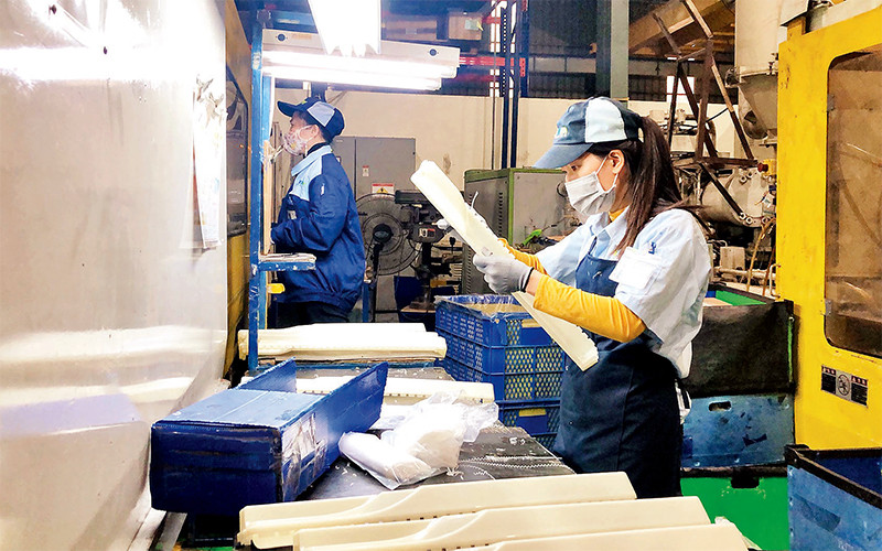 Lao động tại Công ty cổ phần Nhựa Hiệp Hòa - Việt Nam, huyện Đông Anh, Hà Nội (Ảnh minh họa).