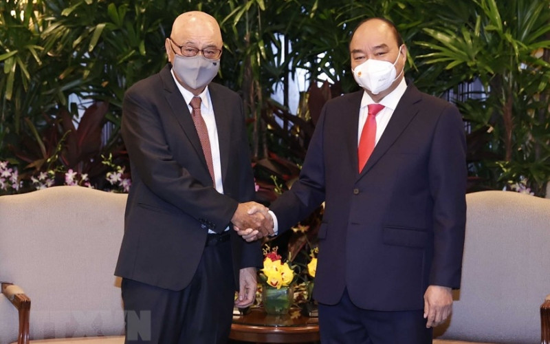 Chủ tịch nước Nguyễn Xuân Phúc tiếp ông Ang Kong Hua, lãnh đạo Tập đoàn Sembcorp Industries. (Ảnh: TTXVN)