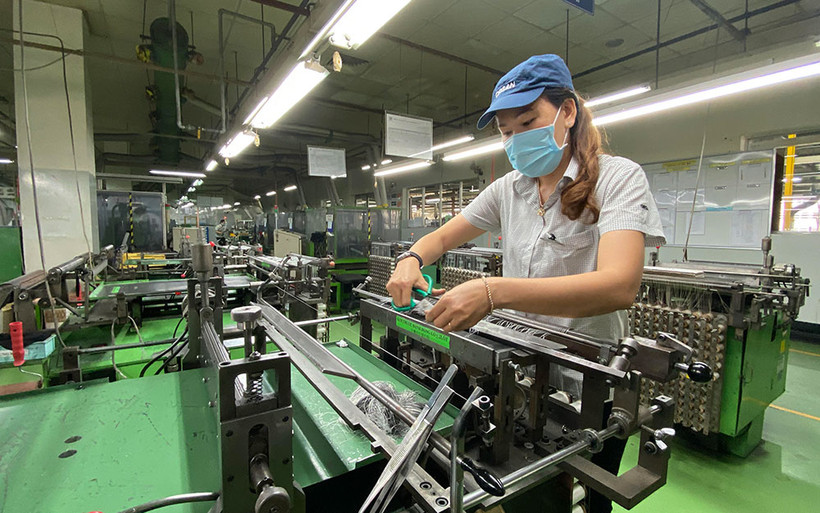 Công nhân làm việc tại Công ty TNHH Organ, Khu chế xuất Tân Thuận, quận 7.