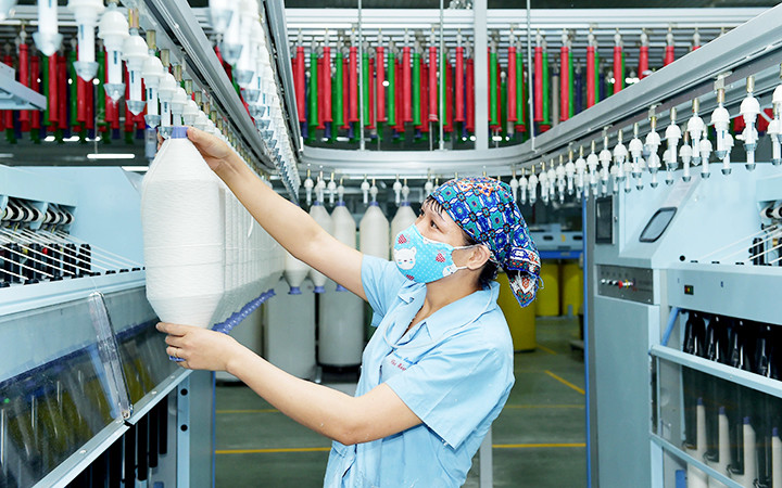 Việc ký kết hiệp định EVFTA sẽ mở ra cơ hội rất lớn cho nhiều ngành của Việt Nam, trong đó có dệt may. Ảnh: XUÂN QUẢNG