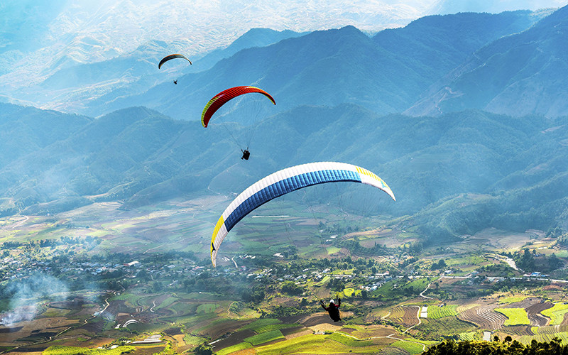Màn tranh tài tại Festival Dù lượn Tam Đường 2021. Ảnh: Mạnh Cường