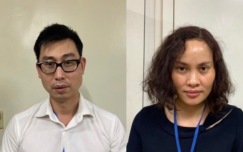 Bị can Phạm Đức Tuấn (nam áo trắng) và bị can Ngô Thị Thu Huyền (nữ áo xanh đen) (Ảnh: Bộ Công an).