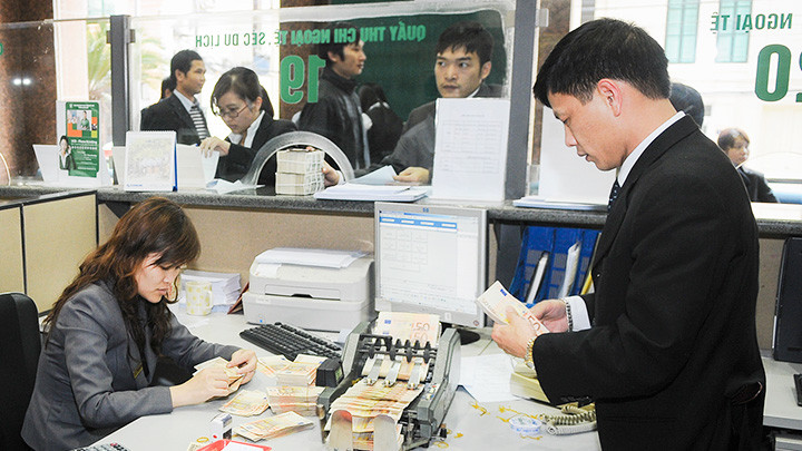 Tỷ giá trong nước khó biến động mạnh. Ảnh: NAM HẢI