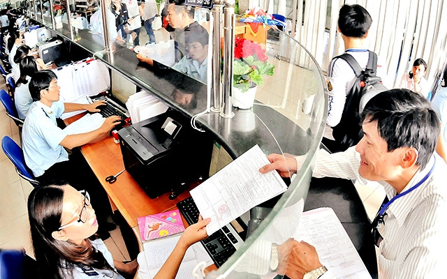 Doanh nghiệp làm thủ tục thông quan hàng hóa tại cảng Cát Lái, TP Hồ Chí Minh (Ảnh minh họa: Hoàng Liêm).